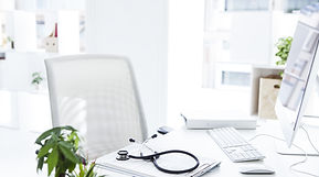 Doctor's desk with medical equipment for veterinary consultations